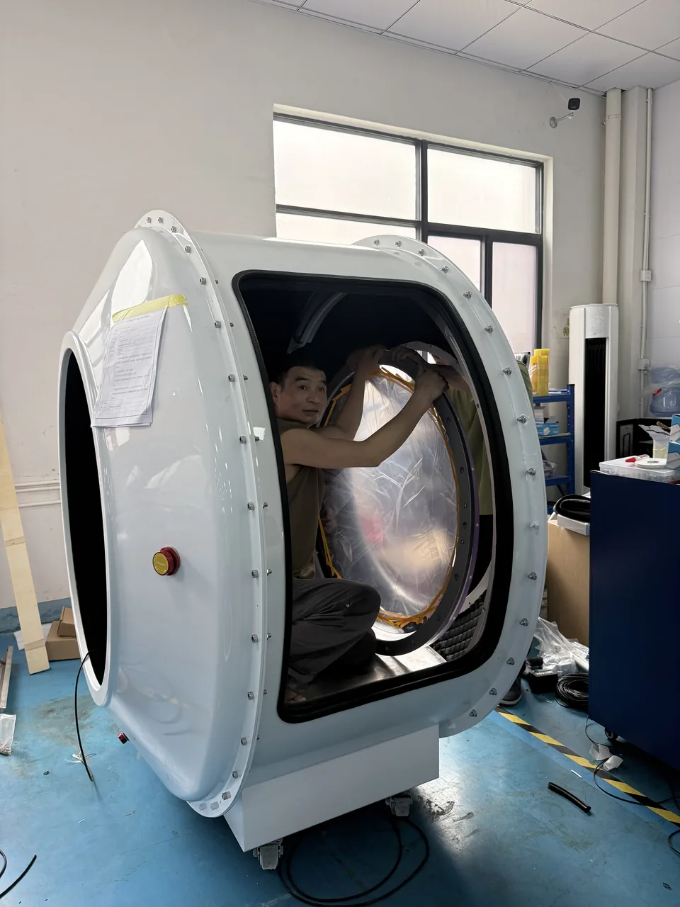 White LUMEN with both dome windows fitted, during interior fit-out